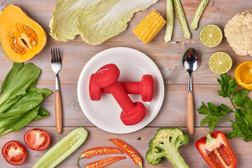 Food and sheet of paper with a diet plan on a dark wooden table. Concept of diet and healthy...