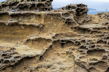 Honeycomb weathering patterns in the Yehliu Geopark, New Taipei, Taiwan, China