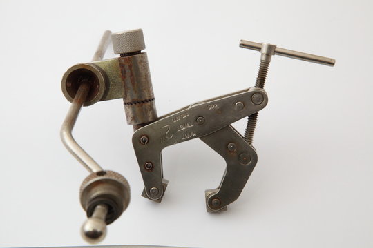 Medical instruments used in neurosurgery. Medical instruments for trepanation of the skull. Medical instruments in need of restoration.