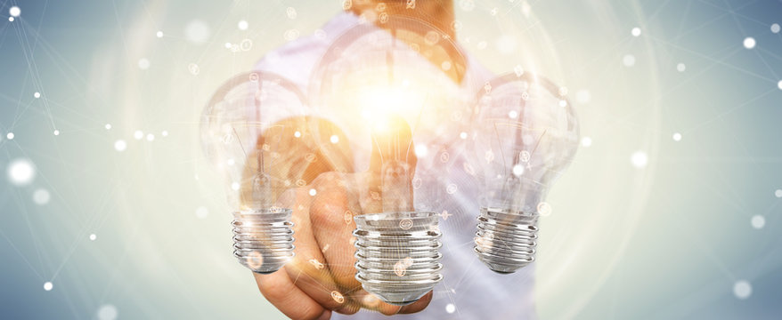 Businessman connecting modern lightbulbs with connections 3D rendering