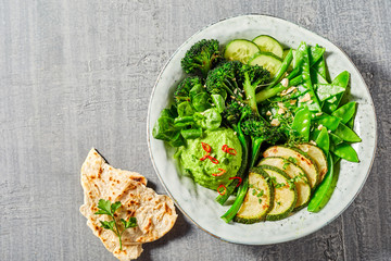 Buddha bowl with green vegetables