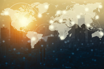 World map and digital connection technology icons with blurred city on background. Business and...
