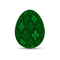 Knitted easter egg with royal lilies. Easter egg with a knitted pattern of Bourbon lilies in green tones
