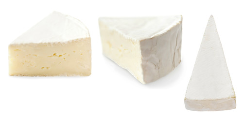 Piece of camembert cheese isolated on white background close up. Fresh soft cheese.
