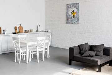 dining table on kitchen at modern studio apartment