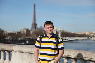 Happy smiling tourist  in Paris, France.