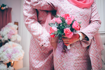 Malay Wedding bride during the marriage ceremony. Selective Focus. Tones Image.