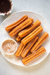 Churros with cinnamon sugar and chocolate sauce