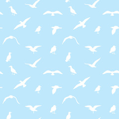 Seamless texture with flying seagulls.