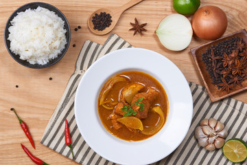 Chicken curry in a bowl / Vietnam chicken curry on wooden background
