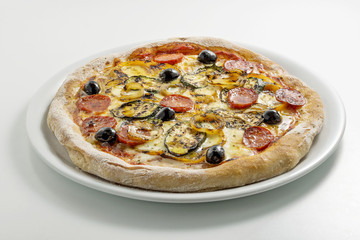 Pizza mozzarella tomato salami and grilled vegetables