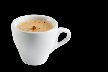 coffee in a porcelain cup, black coffee and white meringues, the dynamics and spike of coffee, falling drops
