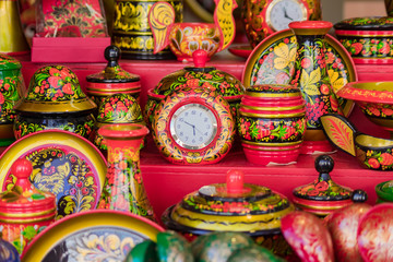 Khokhloma utensils. Wooden spoons and bowls in in Russian folk style