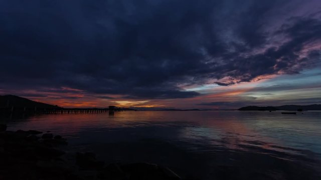 4K-of Timelapse sunrise,Beautiful colorful color and dramatic light sunrise sky and clouds over tropical sea,night to day