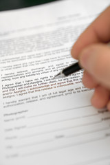 Man is signing model release for microstock.