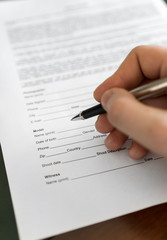 Man is signing model release for microstock.