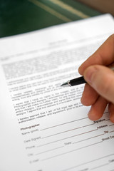 Man is signing model release for microstock.