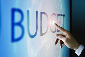 Businessman touching the screen about budget