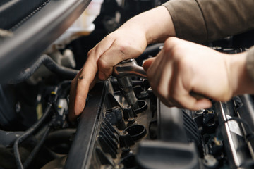 Fototapeta na wymiar Professional mechanic checking car engine