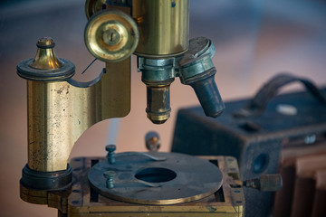 Old ancient microscope detail close up