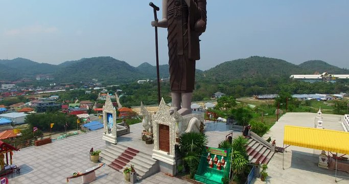 aerial photography big Buddha stature standing on the hill at wat Khao Noi Hin Lek Fai,Hau Hin,Prajuab Kirikun