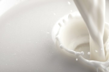 Pouring white Milk