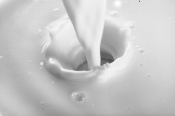 Pouring white Milk