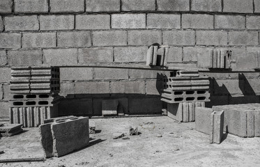 Brick and Tools For the construction of the wall black and white background with copy space