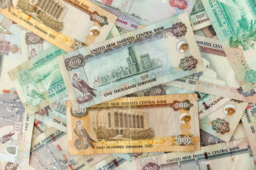 UAE dirhams, banknotes closeup, flat lay view
