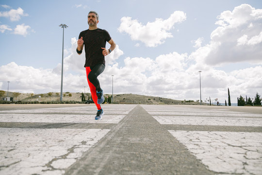 Man Running Towards The Camera