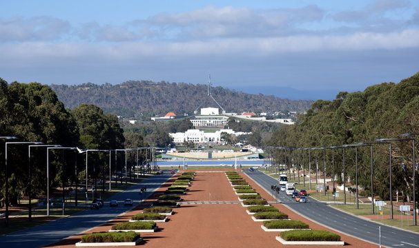 Canberra, Australia - March 10, 2018. Anzac Parade running from The Australian War Memorial in direction of Parliament House, Canberra. View of Anzac Parade and Parliament House in Canberra, Australia
