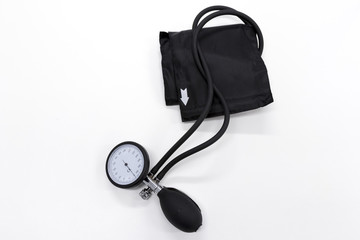 Sphygmomanometer or  blood-pressure cuff on a white background
