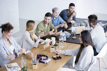 Coworkers having lunch