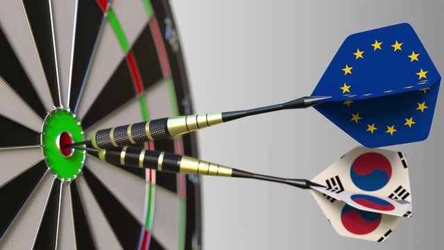 Flags of the European Union and Korea on darts hitting bullseye of the target. International cooperation or competition conceptual animation