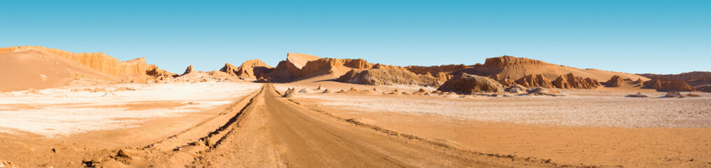 Road and salt formations at “Valle de la Luna” (spanish for Moon Valley), San Pedro de Atacama, Los Flamencos National Reserve, Atacama desert, Antofagasta Region, Chile, South America