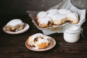 Traditional Austrian pastries. Buchteln with vanilla sauce.