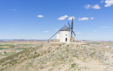 Travel, Beautiful summer above the windmills on the field in Spain