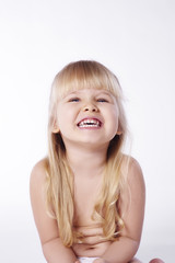 Portrait of naked girl at studio shot