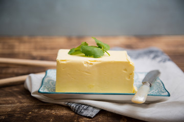 A piece of square natural milk butter 
