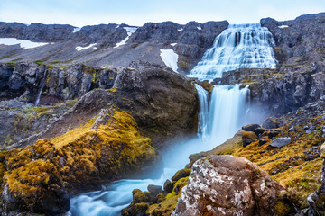Dynjandi foss cascade waterfall with mossy canyon in the foreground, West Iceland