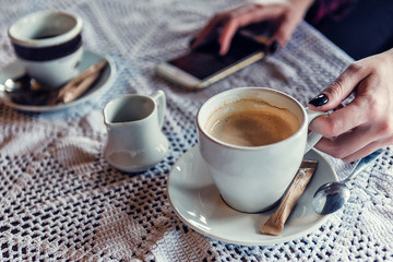 hands with cup of coffee