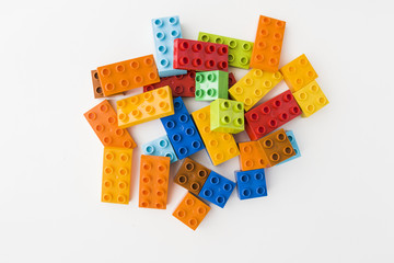 colorful toy bricks on white background