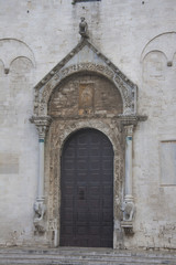 Fototapeta na wymiar Entrance to medieval cathedral in Bari, Southern Italy