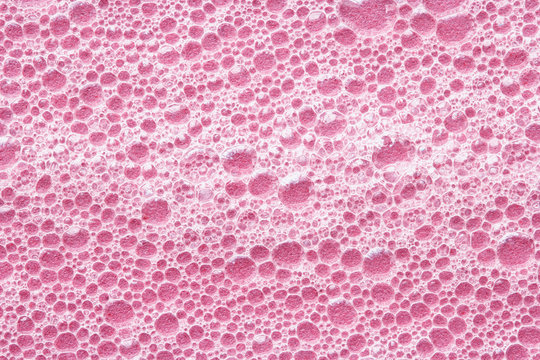 soap foam on a pink background
