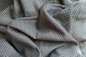 Rumpled grey viscose fabric with geometric print