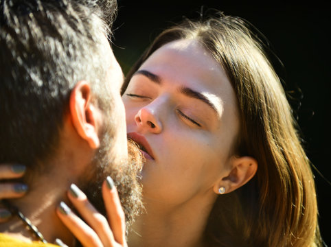 Man and woman with romantic face on sunny outside background