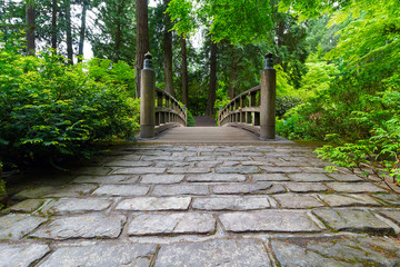 Cobblestone Path to Wood Bridge in Japanese Garden