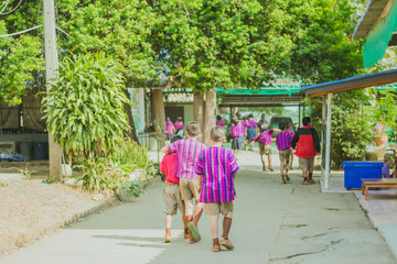 Group of Friends Having Fun on street in primary school.