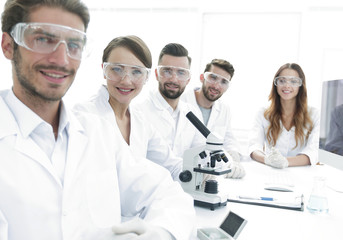 Fototapeta premium Male scientist and the team in the lab.