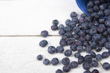 Blueberry on wooden table background, bowl of blueberries. .Antioxidants, detox diet, organic fruits. Berries
